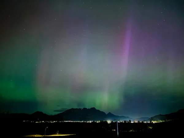 Aurora Australis dances strongly in November over Shotover River, New zealand
