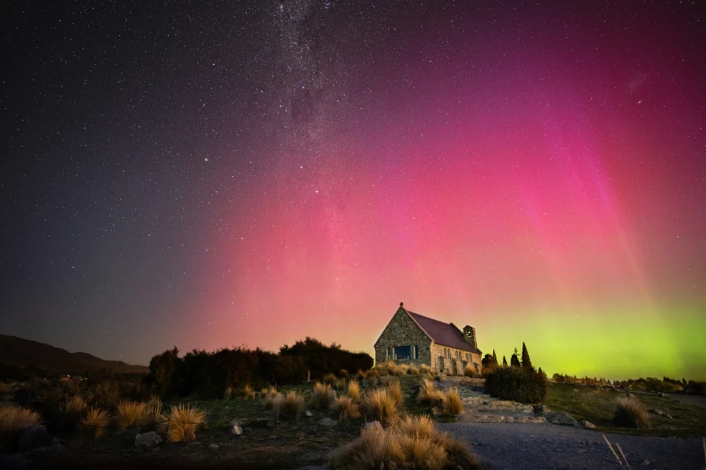 The Aurora Australis/Southern Lights over the famous Church of the Good Shepherd at Lake Tekapo, New Zealand.